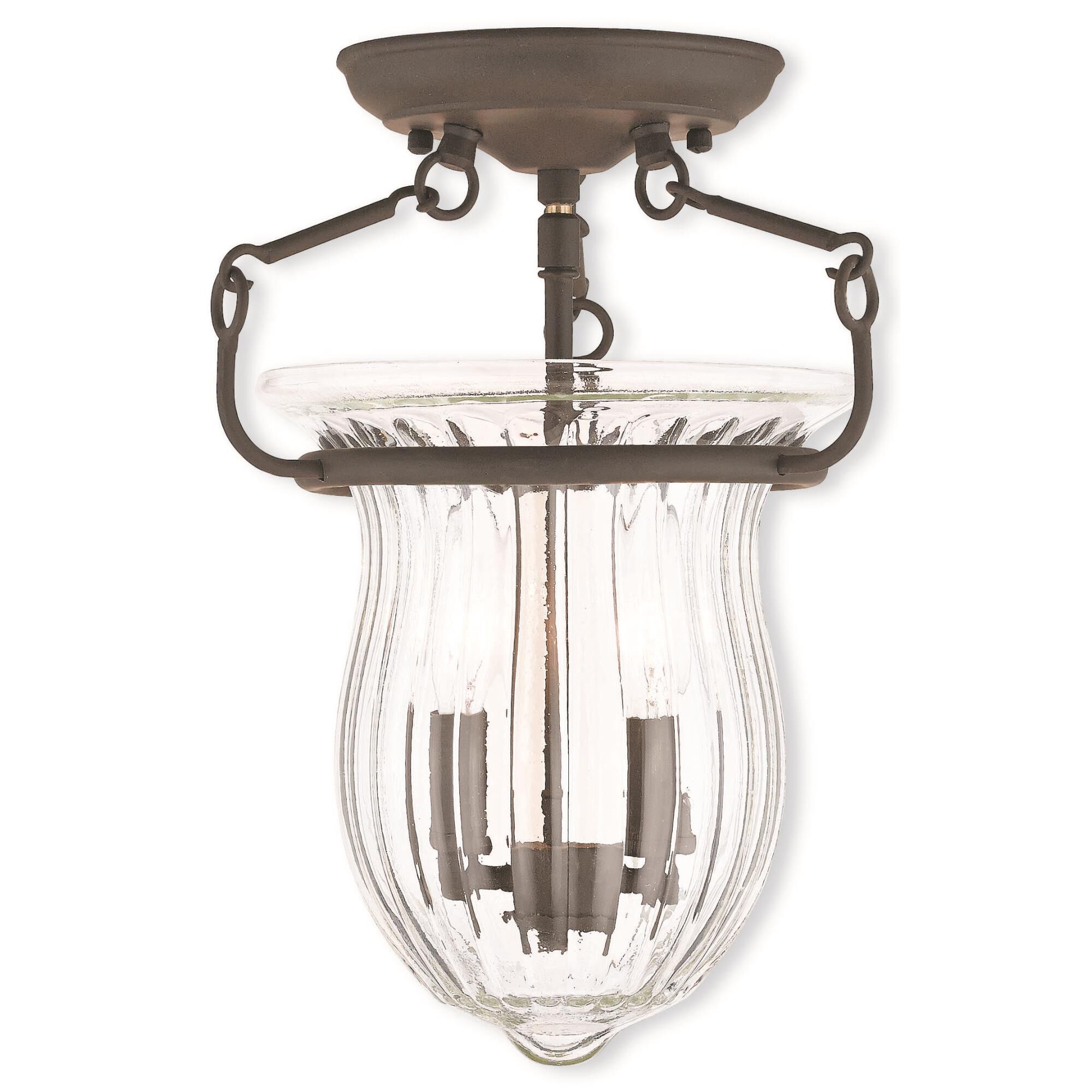 Shown in Bronze finish and Hand Crafted Fluted Clear glass 